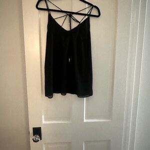 Black tank size S w/ tie back detail.
